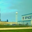 SpaceX launch facility at Boca Chica, Texas, featuring the launch tower and facility building. SpaceX launch facility at Boca Chica, Texas, featuring the launch tower and facility building.
