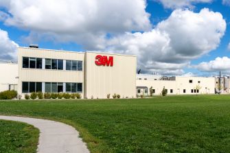 3M manufacturing facility with the company logo prominently displayed on the building.