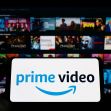 A smartphone displaying the Prime Video logo in front of a blurred TV screen with various movie and show thumbnails. A smartphone displaying the Prime Video logo in front of a blurred TV screen with various movie and show thumbnails.