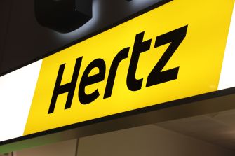 Signage for Hertz, a company that filed for Chapter 11 bankruptcy during the COVID-19 pandemic.