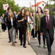 A group of young plaintiffs and their attorney walking together, advocating for climate rights in Montana. A group of young plaintiffs and their attorney walking together, advocating for climate rights in Montana.