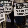 Demonstrators holding signs advocating for electors to "Vote Your Conscience" during a protest related to the Electoral College. Demonstrators holding signs advocating for electors to "Vote Your Conscience" during a protest related to the Electoral College.