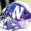 A Northwestern University football helmet with a prominent "N" logo. A Northwestern University football helmet with a prominent "N" logo.