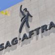 SAG-AFTRA logo displayed on a building exterior. SAG-AFTRA logo displayed on a building exterior.