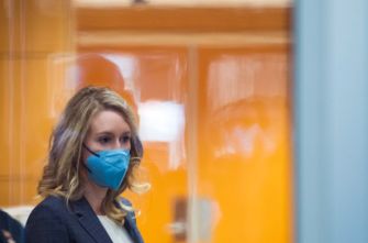 Elizabeth Holmes, founder of Theranos, appearing in court following her conviction on charges of wire fraud and conspiracy.