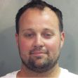 Mugshot of Josh Duggar after being charged with possession and receiving child pornography. Mugshot of Josh Duggar after being charged with possession and receiving child pornography.