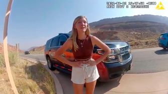 Footage of Gabby Petito during a police stop, showing her visibly distressed.