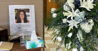 Memorial display for Cheyenna Costello, featuring a framed photo, flowers, and a tissue box.