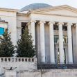 Exterior view of the Alabama Supreme Court building with the American flag in the foreground. Exterior view of the Alabama Supreme Court building with the American flag in the foreground.
