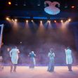 A performance from "The Unofficial Bridgerton Musical" featuring four singers on stage in a theatrical setting. A performance from "The Unofficial Bridgerton Musical" featuring four singers on stage in a theatrical setting.