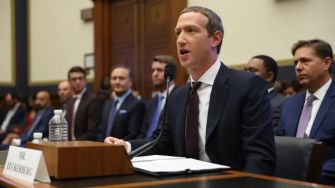 Mark Zuckerberg testifying before Congress regarding misinformation on Facebook.