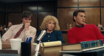 A still from a courtroom scene featuring characters, possibly portraying individuals involved in the Menendez brothers' trial.