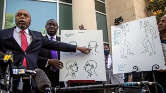 A press conference where attorneys present evidence related to the shooting of Andrew Brown Jr. with diagrams illustrating injuries.