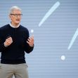 Tim Cook speaking at a presentation event with a visually abstract background. Tim Cook speaking at a presentation event with a visually abstract background.