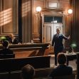 A courtroom scene depicting a legal discussion involving a judge, lawyers, and audience members. A courtroom scene depicting a legal discussion involving a judge, lawyers, and audience members.