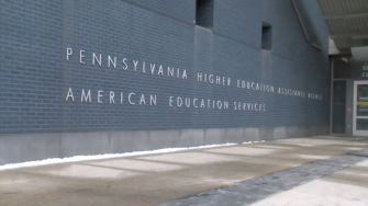 Facade of the Pennsylvania Higher Education Assistance Agency building, featuring the agency's name and American Education Services.