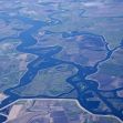 Aerial view of the Del Puerto Canyon area, showing rivers and agricultural land. Aerial view of the Del Puerto Canyon area, showing rivers and agricultural land.