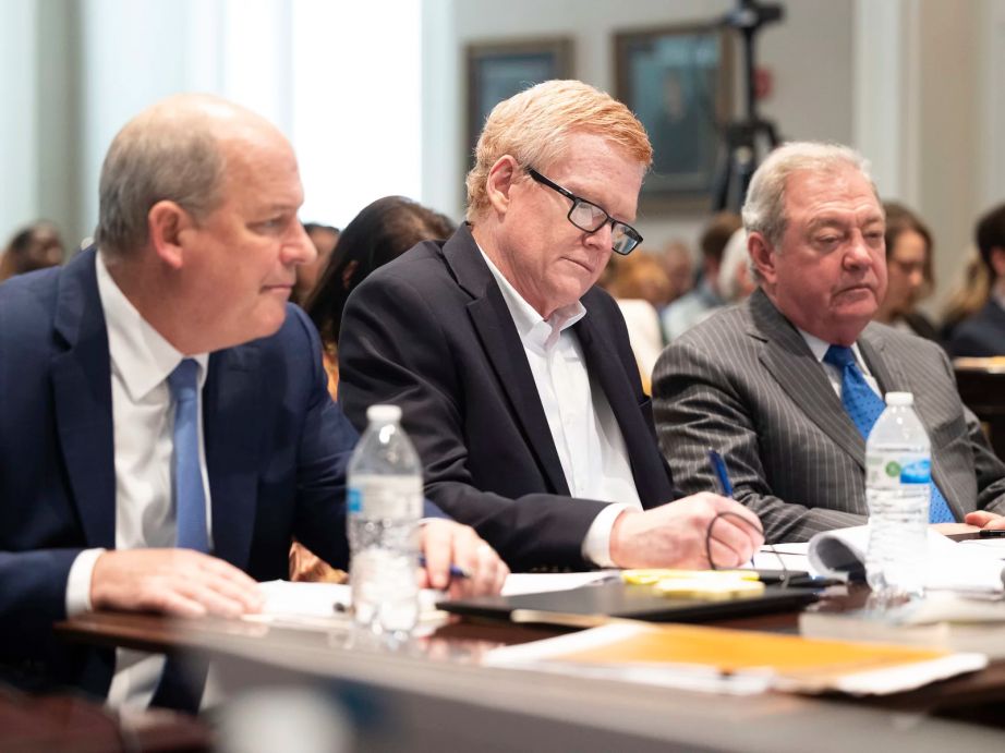 The legal team for Alex Murdaugh (center) presented their closing argument in his double murder trial on Thursday. He's seen here listening to prosecutor Creighton Waters make his closing arguments at the Colleton County Courthouse in Walterboro, S.C. (Joshua Boucher/The State via AP, Pool via NPR)