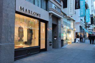 A view of the Marlowe retail store in San Francisco, showcasing its window display and the surrounding shopping area.