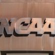 NCAA logo displayed on a building facade. NCAA logo displayed on a building facade.