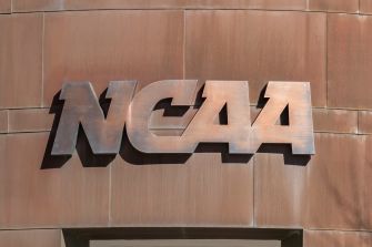 NCAA logo displayed on a building facade.