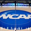 NCAA logo on a basketball court during a March Madness event. NCAA logo on a basketball court during a March Madness event.