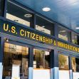 U.S. Citizenship and Immigration Services office entrance, highlighting the agency involved in asylum and immigration cases. U.S. Citizenship and Immigration Services office entrance, highlighting the agency involved in asylum and immigration cases.
