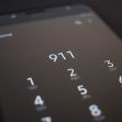 Image of a smartphone displaying the emergency 911 dialing screen. Image of a smartphone displaying the emergency 911 dialing screen.