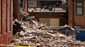 Image of the rubble and debris from the collapsed apartment building in Davenport, Iowa.