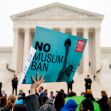 A protestor holding a sign that reads "No Muslim Ban" in front of the Supreme Court building, with a crowd gathered around. A protestor holding a sign that reads "No Muslim Ban" in front of the Supreme Court building, with a crowd gathered around.