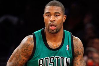 Former NBA player on the court in a game.