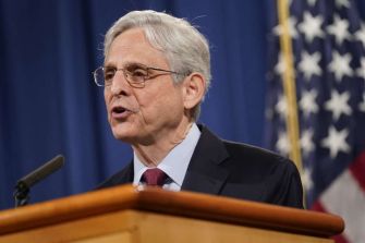 Attorney General Merrick B. Garland delivering a statement on the new policy regarding the protection of reporters' records and communications.