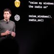 Sam Altman speaking during a presentation, with code and text displayed behind him. Sam Altman speaking during a presentation, with code and text displayed behind him.