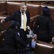 Rep. Jim Jordan, R-Ohio, prepares to evacuate the floor as protesters try to break into the House Chamber at the U.S. Capitol on Wednesday, Jan. 6, 2021, in Washington.