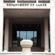 Building exterior with the words "Department of Labor" displayed prominently above the entrance. Building exterior with the words "Department of Labor" displayed prominently above the entrance.