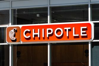 Chipotle restaurant sign with the logo displayed prominently.