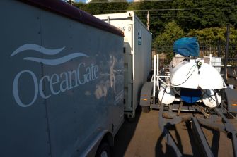 A trailer and submersible belonging to OceanGate Expeditions, highlighted in the context of the Titan submersible incident.
