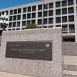 Sign for the United States Department of Labor building in front of the structure. Sign for the United States Department of Labor building in front of the structure.