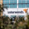 Logo and building of SolarWinds, a network-management software company, captured in an outdoor setting. Logo and building of SolarWinds, a network-management software company, captured in an outdoor setting.