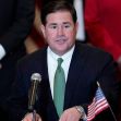 April 15, 2021, file photo, Arizona Republican Gov. Doug Ducey speaks during a bill signing in Phoenix.