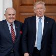 Rudy Giuliani and Donald Trump posing outside a building. Rudy Giuliani and Donald Trump posing outside a building.