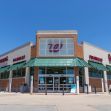 Walgreens storefront with signage indicating pharmacy and general retail services. Walgreens storefront with signage indicating pharmacy and general retail services.