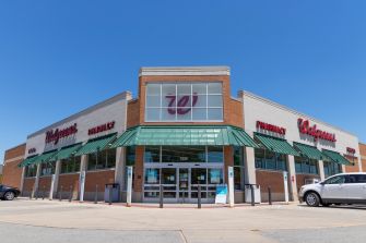 Walgreens storefront with signage indicating pharmacy and general retail services.