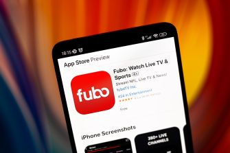 Screenshot of the Fubo app in an app store preview, highlighting its features for streaming live sports and TV.