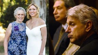 A woman and her daughter standing together, with a man looking concerned in the background.