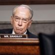 U.S. Senator Chuck Grassley sitting at a committee hearing with a serious expression. U.S. Senator Chuck Grassley sitting at a committee hearing with a serious expression.
