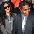 Rapper A$AP Rocky smiles as he exits the courtroom, accompanied by Rihanna, following his not guilty verdict on shooting charges. Rapper A$AP Rocky smiles as he exits the courtroom, accompanied by Rihanna, following his not guilty verdict on shooting charges.