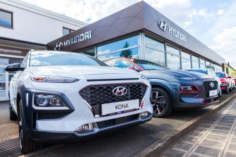 A Hyundai dealership displaying various models, including the Hyundai Kona.