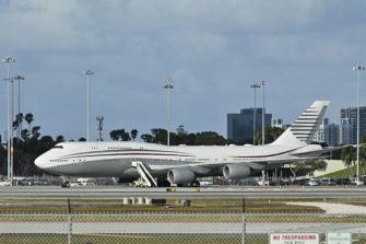 Luxury Boeing 747-8 aircraft on the tarmac.