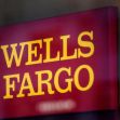 Wells Fargo logo displayed at a branch location. Wells Fargo logo displayed at a branch location.
